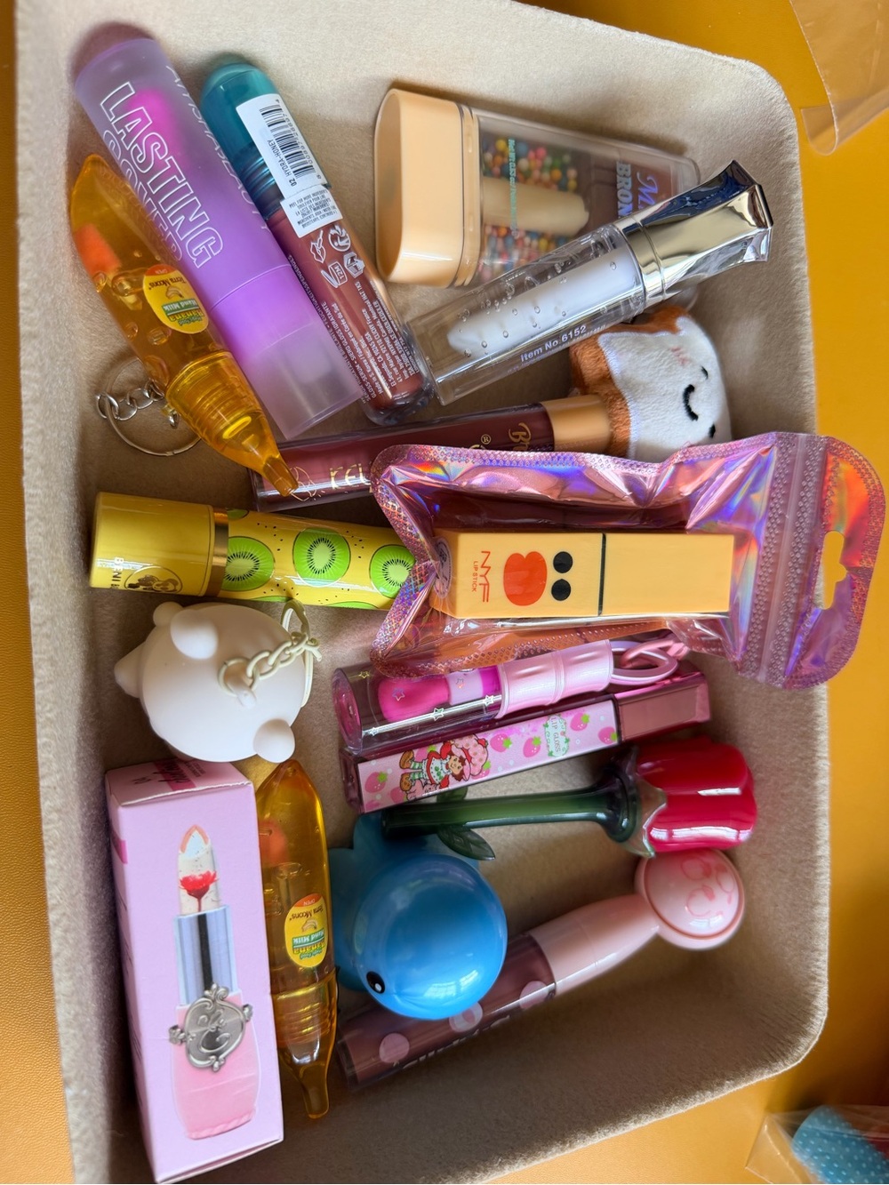 Assorted Pink Lipsticks & Lip Care Collection - Various Brands